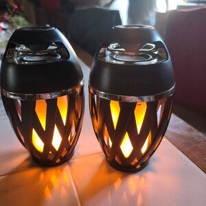 Bluetooth tiki tunes speakers with lights. Rechargeable.